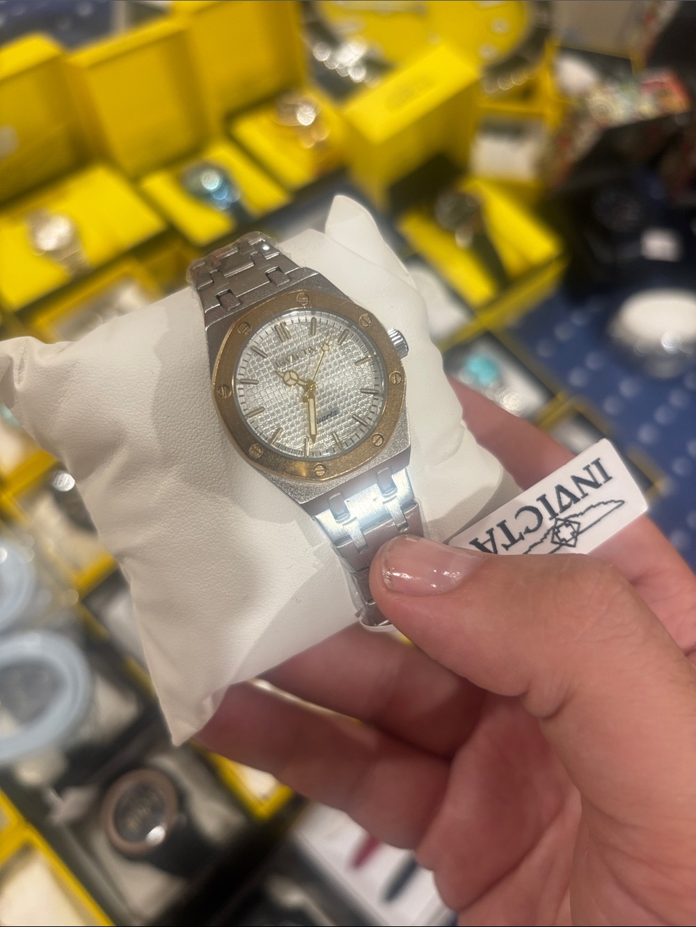 Invicta Two-Tone Silver and Gold women’s Bracelet Watch with Textured White Dial